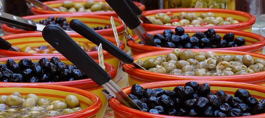 Bowls of black and green olives